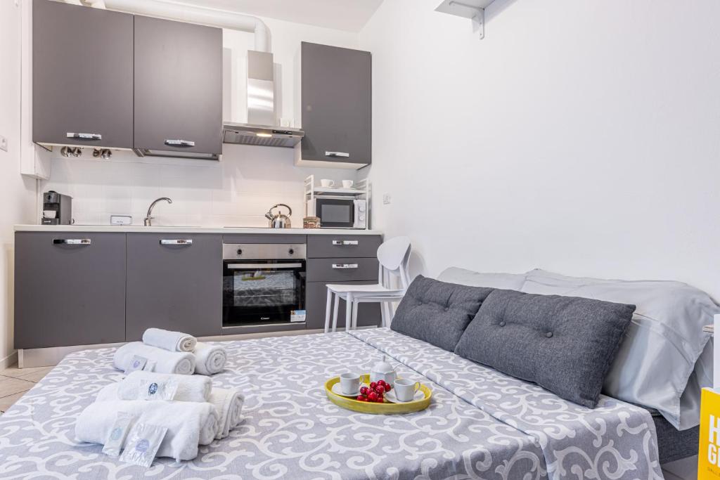 Kuchyň nebo kuchyňský kout v ubytování Gallarate Central Suite