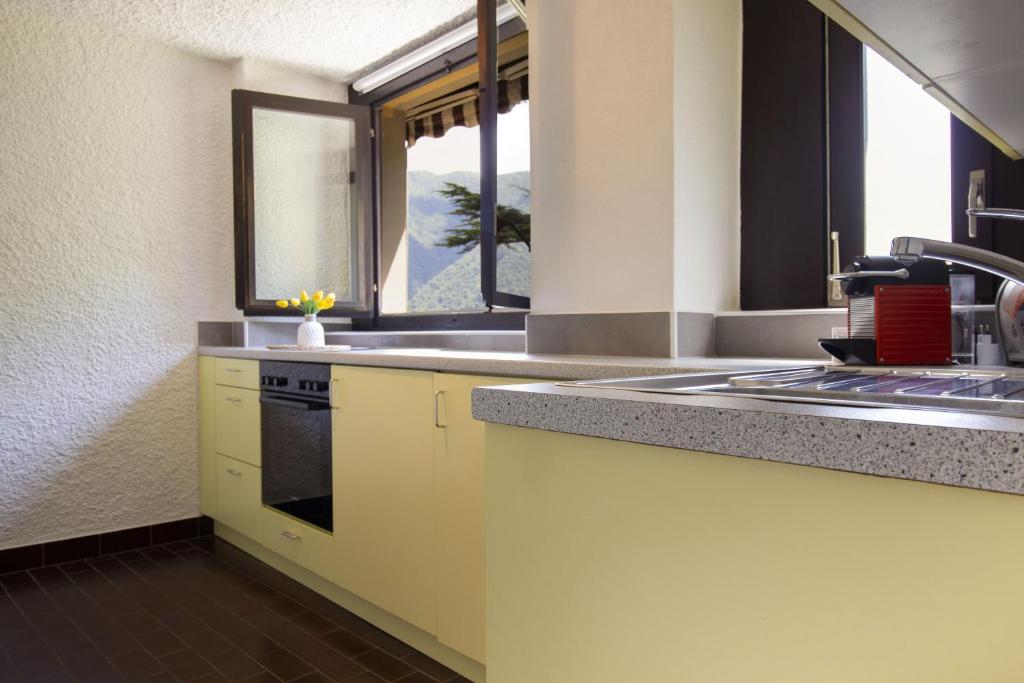 La Castignola con vista lago di Lugano e giardino condiviso - Resim 9