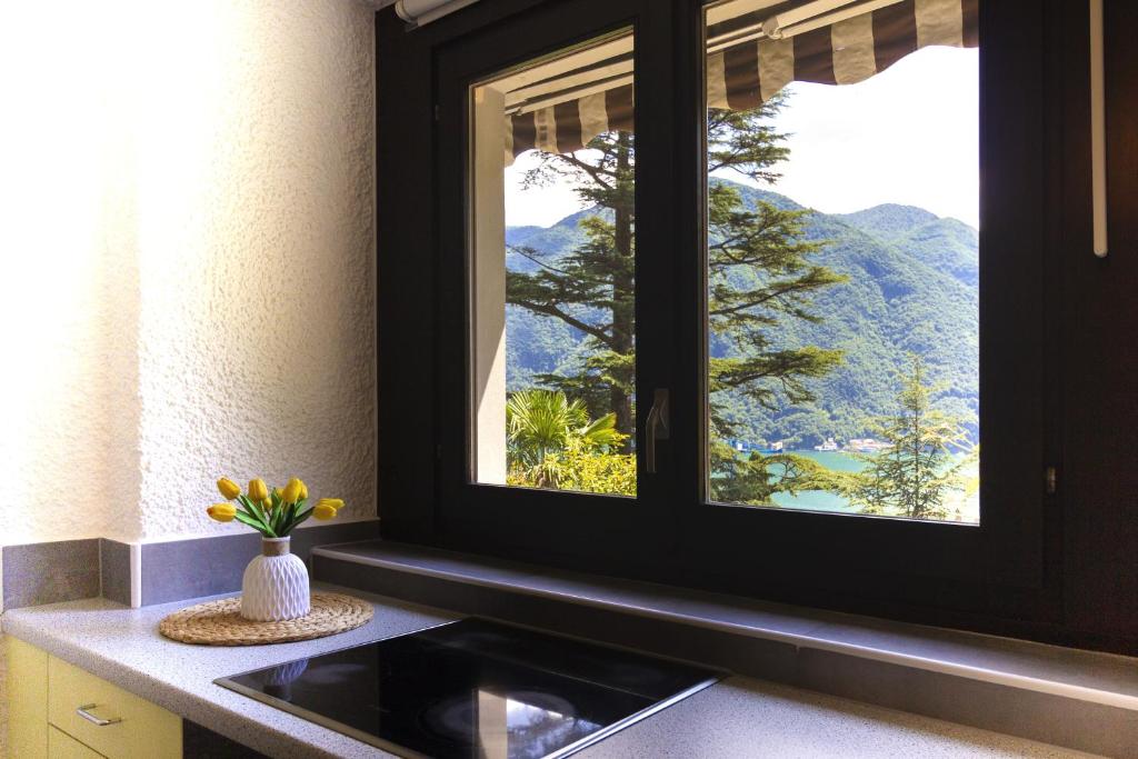 La Castignola con vista lago di Lugano e giardino condiviso - Resim 12