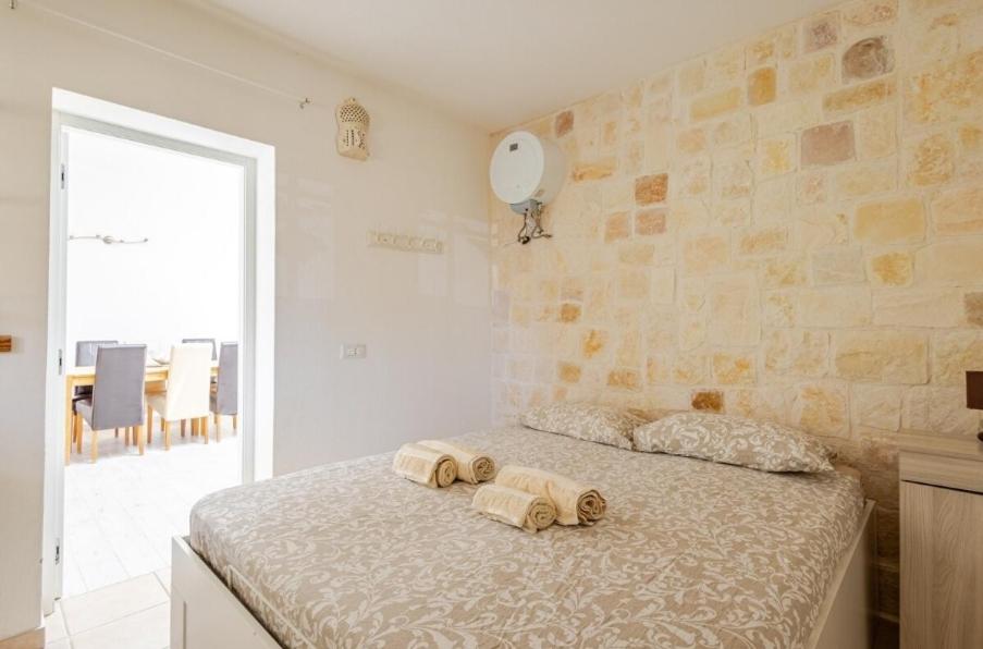 A bed or beds in a room at Casa Relax, comfortable Villa with Sauna and view