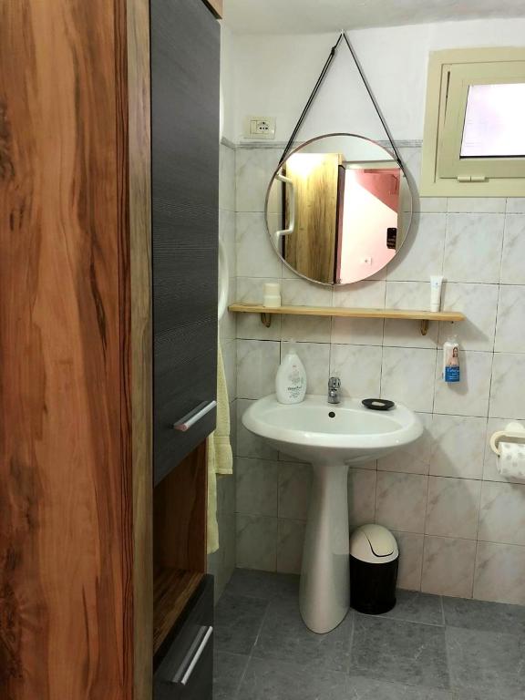 Koupelna v ubytování Guraziu Home