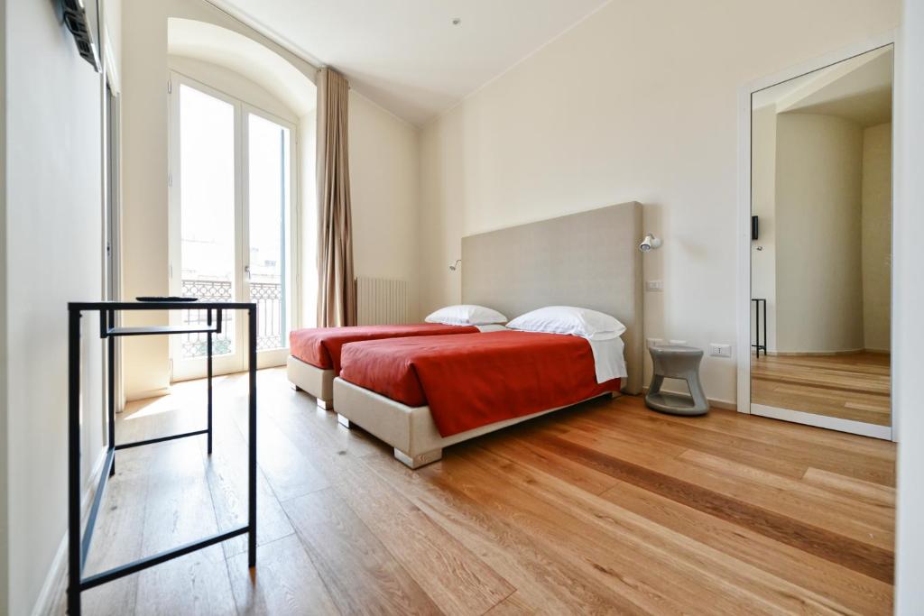 Postelja oz. postelje v sobi nastanitve Alsecondopiano B&B