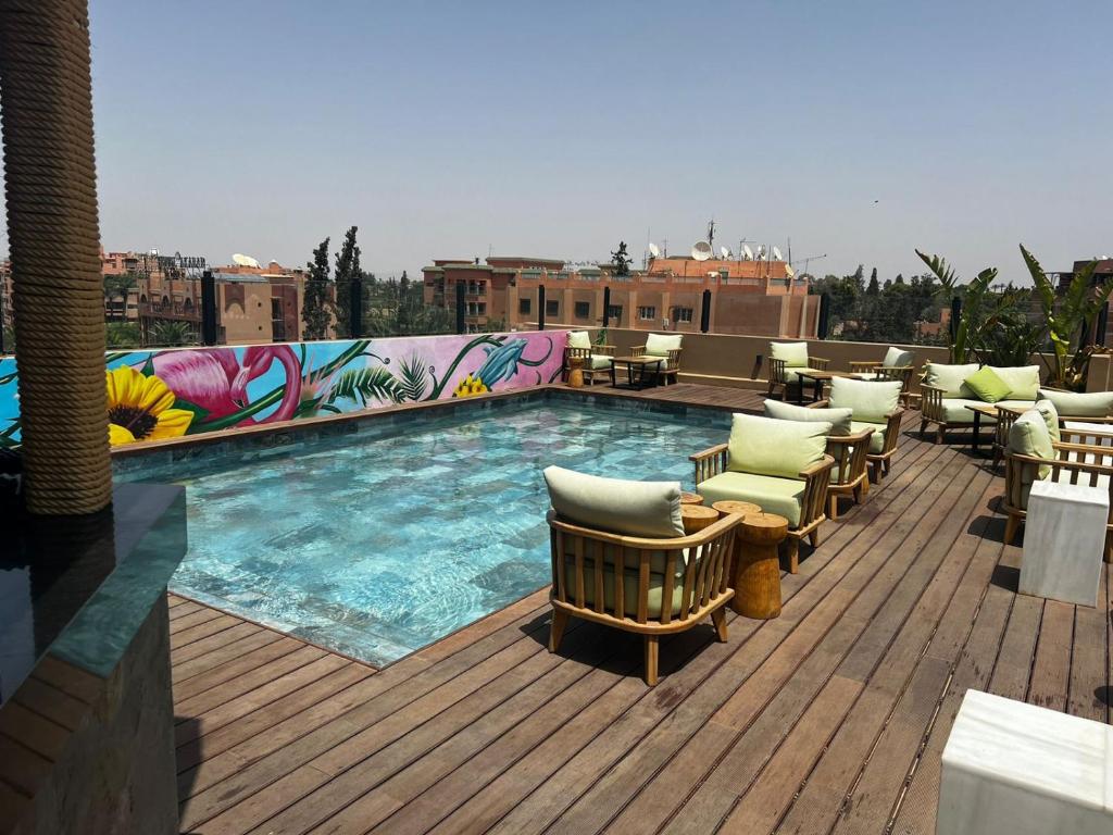 Bazén v ubytování Hotel Le Rocher Marrakech nebo v jeho okolí