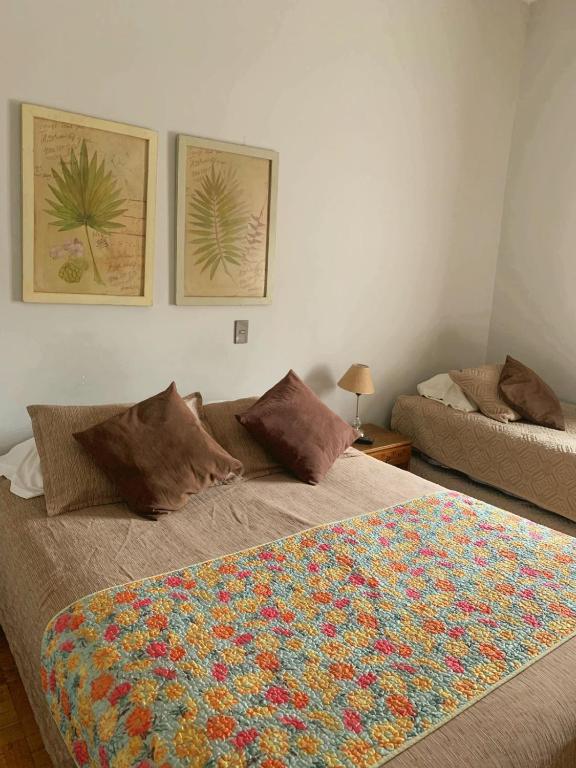 Postel nebo postele na pokoji v ubytování Hotel Universitario