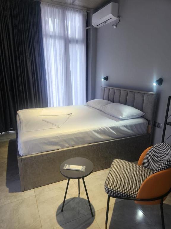 Postel nebo postele na pokoji v ubytování Blue Horizon Apartments