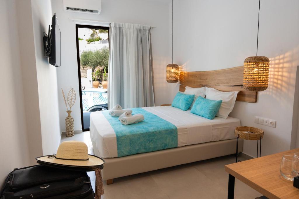 Postel nebo postele na pokoji v ubytování Zoe Boutique Hotel