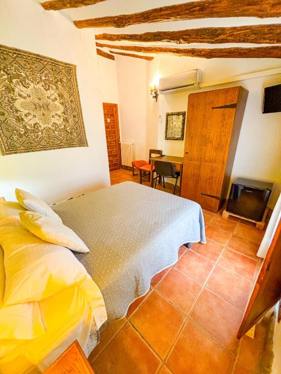 Televízia a/alebo spoločenská miestnosť v ubytovaní Casa Piedralén