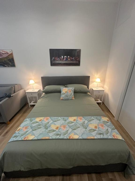 En eller flere senge i et værelse på Taormina Miramare Home