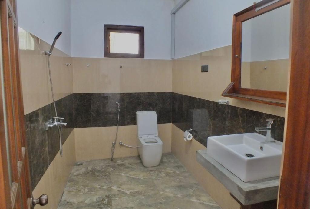 Koupelna v ubytování Maple Home Stay