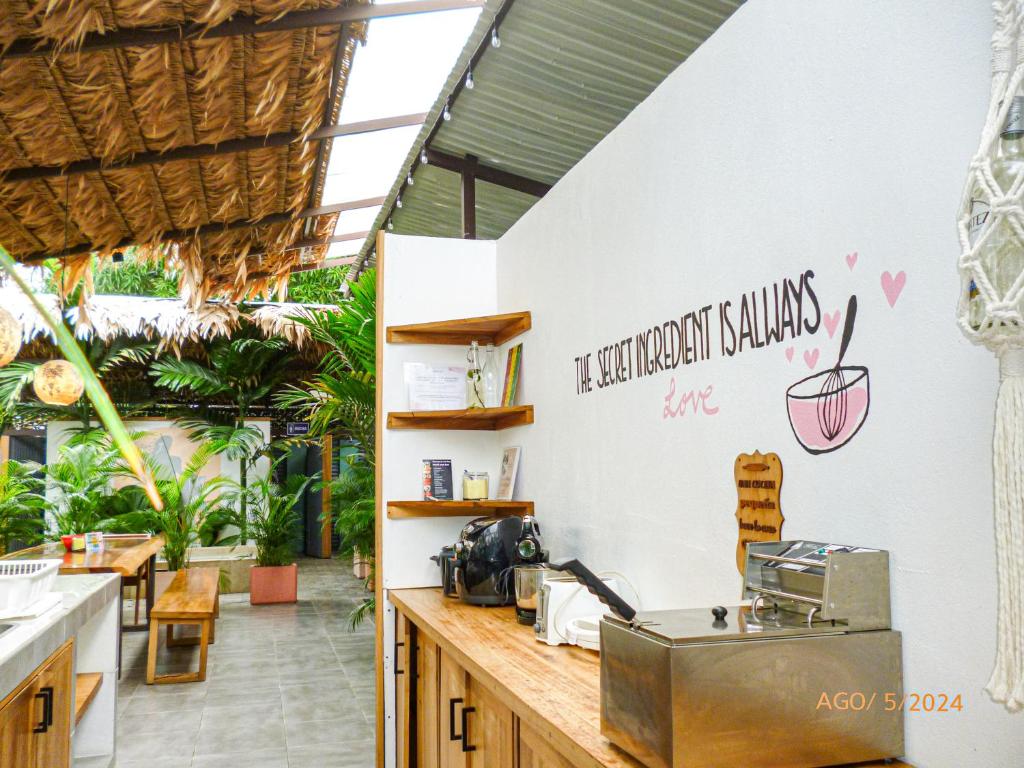 Сертификат, награда, вывеска или другой документ, выставленный в La Tribu Boutique Hostel for women