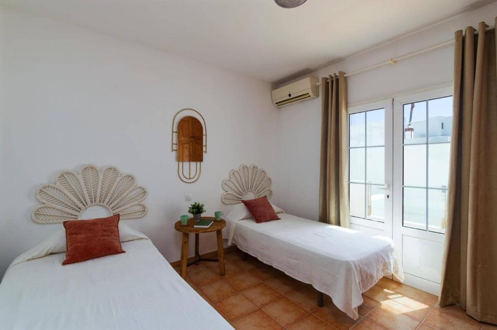 Postel nebo postele na pokoji v ubytování Villa Laurona by Villa Plus