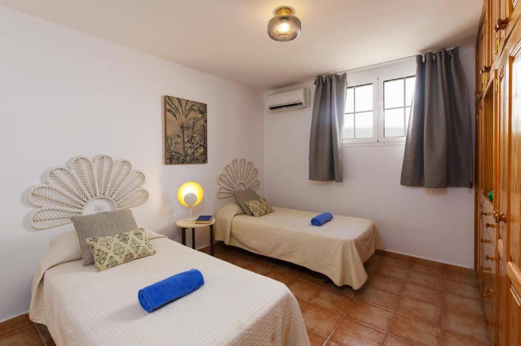 Postel nebo postele na pokoji v ubytování Villa Laurona by Villa Plus