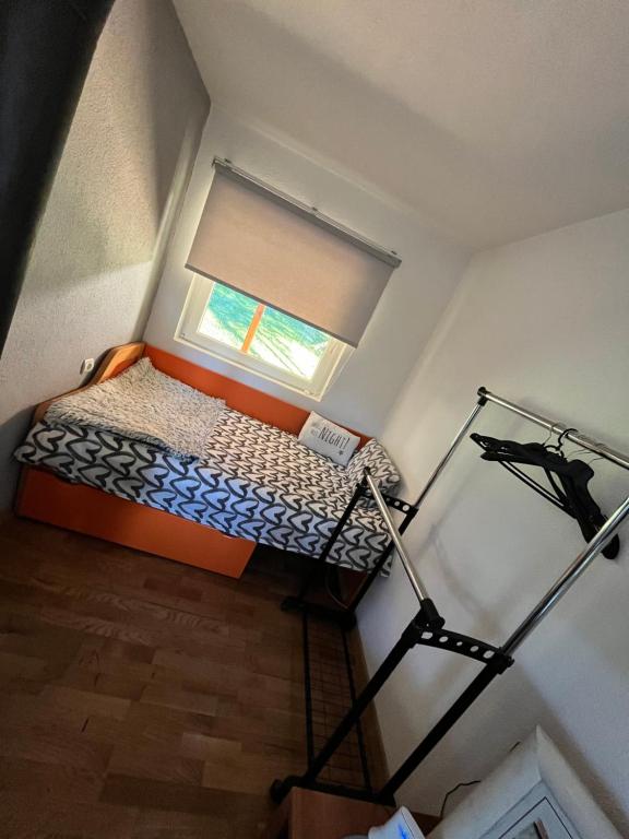 Postel nebo postele na pokoji v ubytování Divčibarski kutak