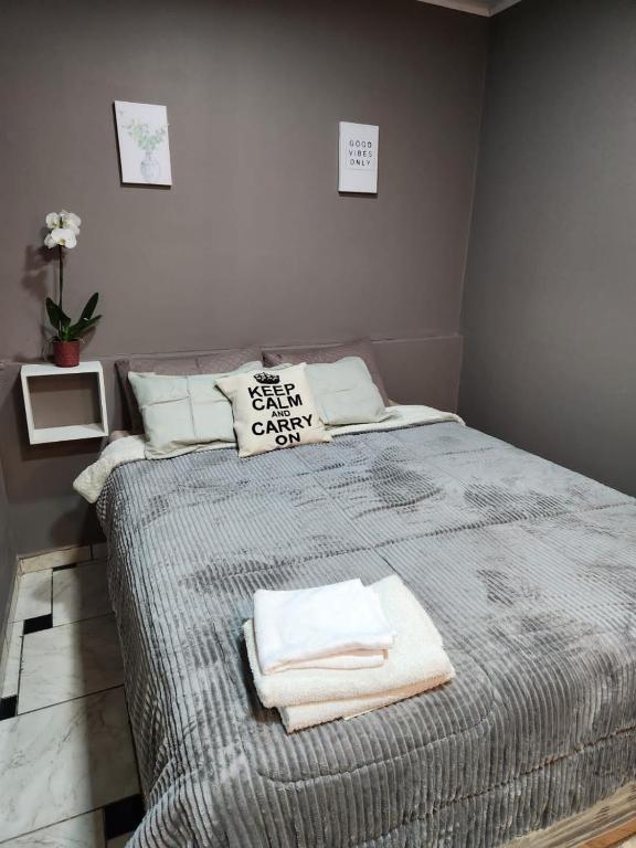 Postel nebo postele na pokoji v ubytování Ivy House Apart Hotel