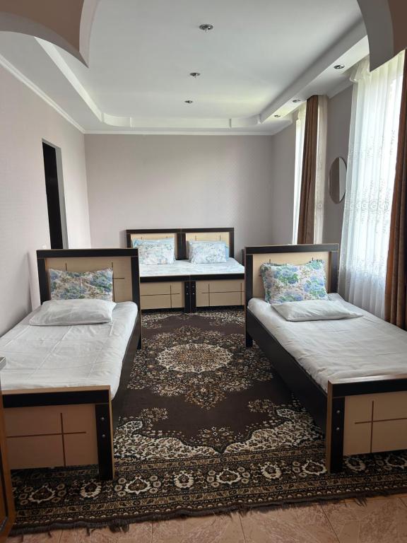 Postel nebo postele na pokoji v ubytování Guesthouse TEA