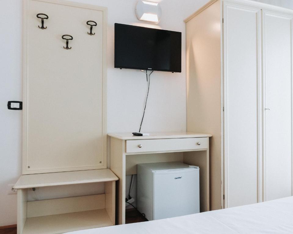 TV a/nebo společenská místnost v ubytování Hotel all'Oasi