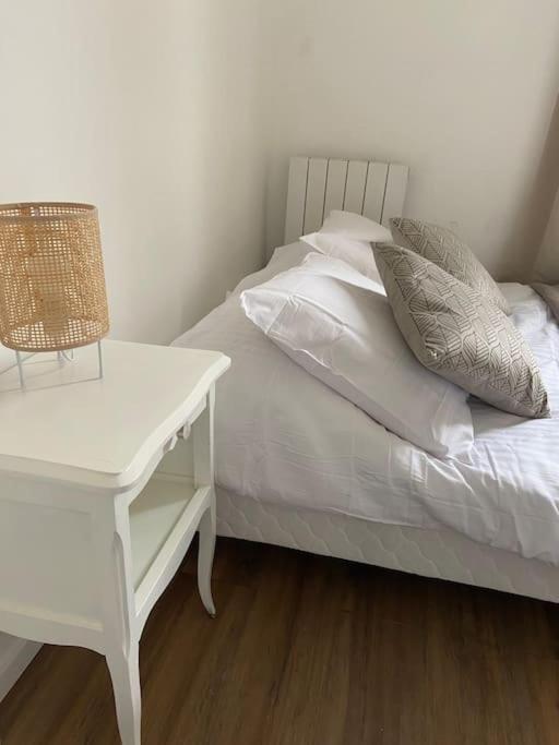 Ένα ή περισσότερα κρεβάτια σε δωμάτιο στο Le Bohème studio central