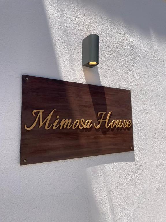 Certifikát, hodnocení, plakát nebo jiný dokument vystavený v ubytování Mimosa House