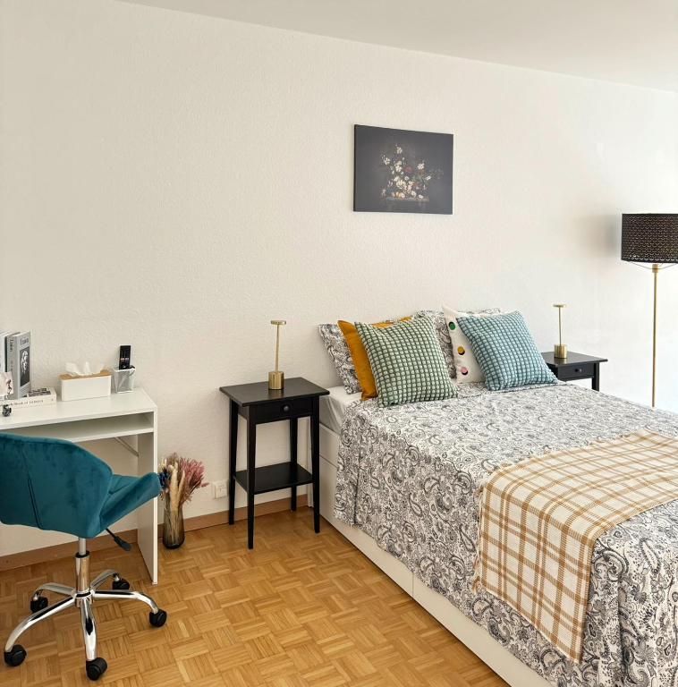 Postel nebo postele na pokoji v ubytování Modernité et confort à Genève