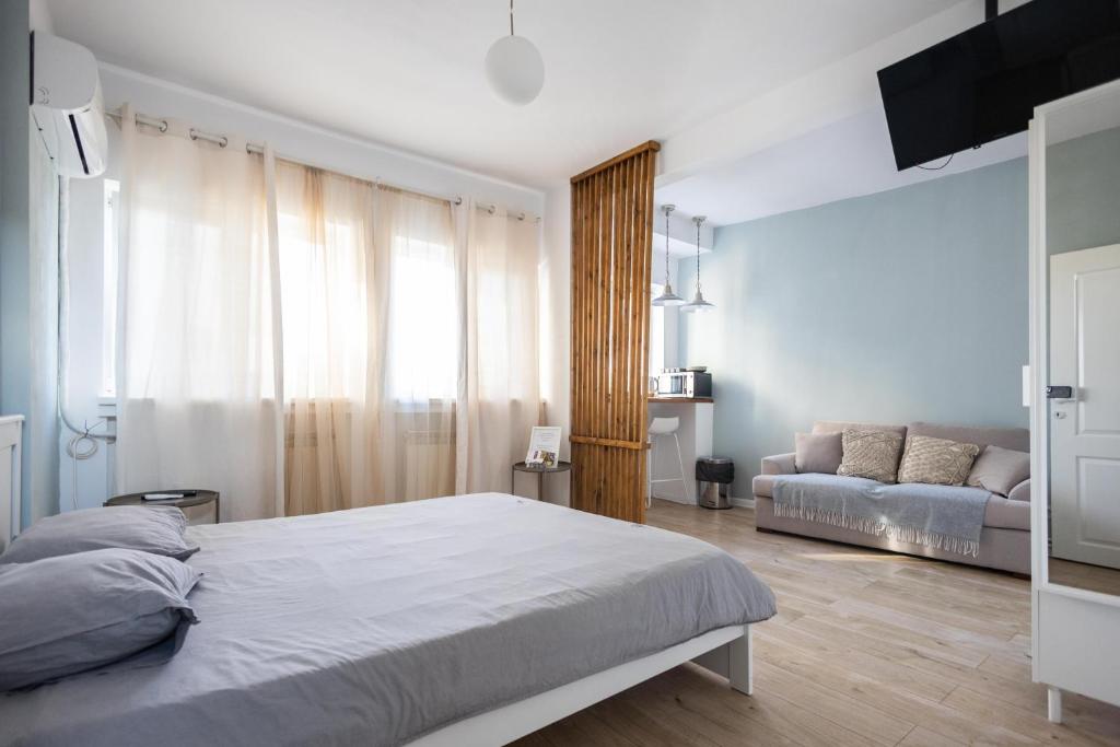 En eller flere senge i et værelse på 1Bed Flat Central Bucharest