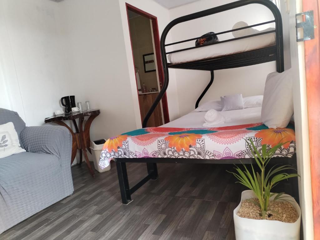Postel nebo postele na pokoji v ubytování Casa Nimbu Rainforest