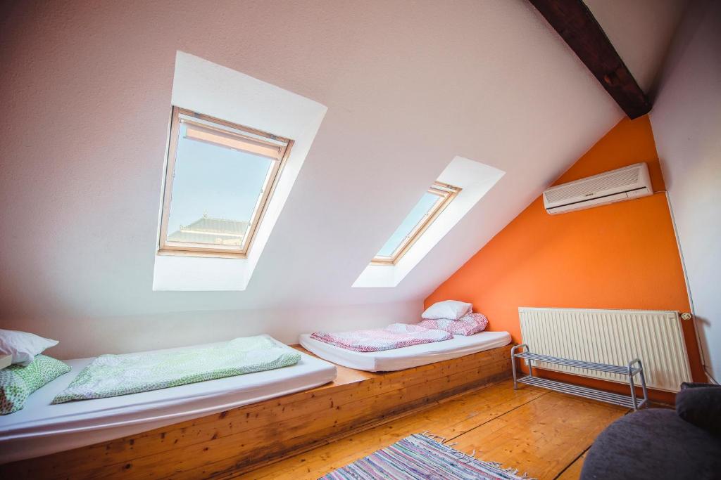 Postel nebo postele na pokoji v ubytování Unity Hostel Budapest