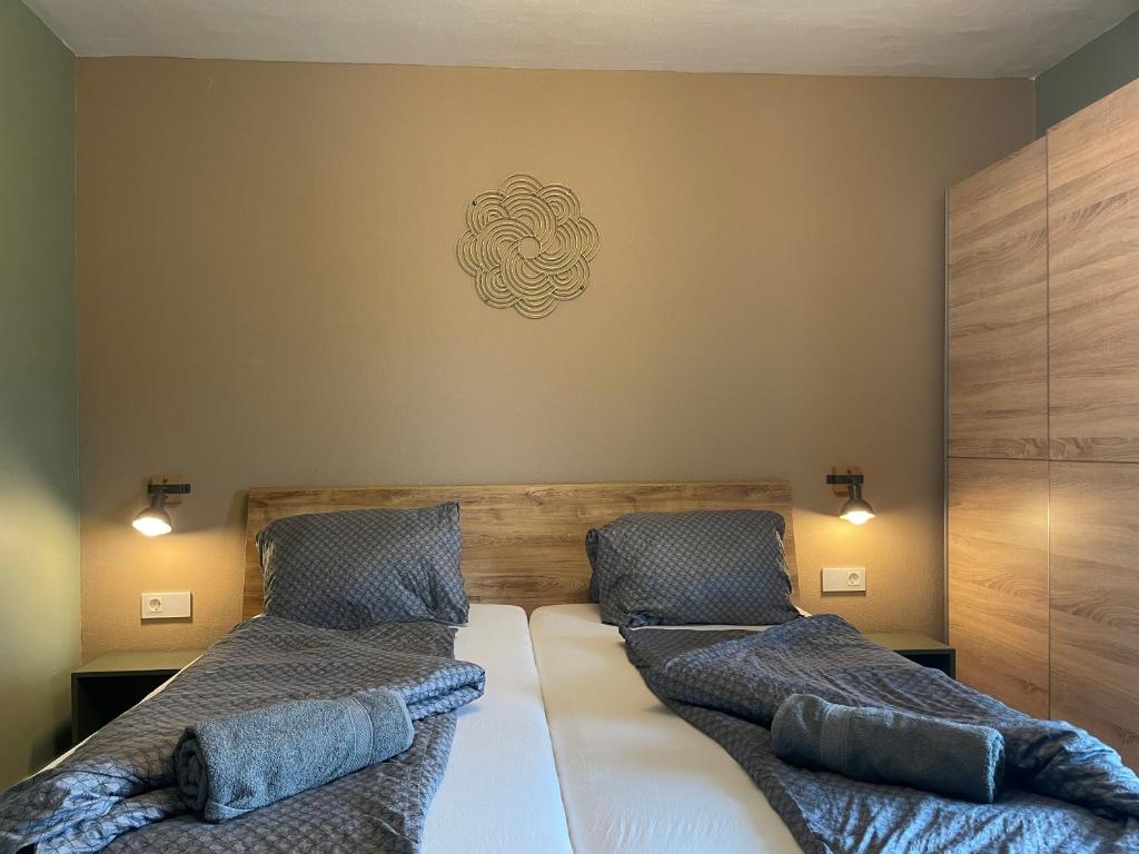 Postel nebo postele na pokoji v ubytování Maxi'Seeblick Apartments