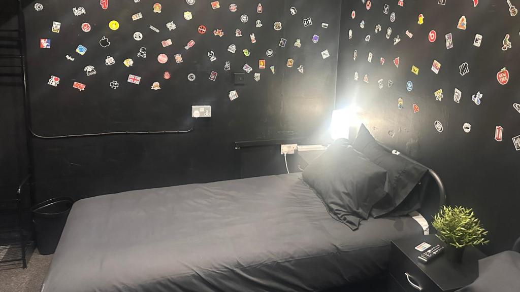 Postel nebo postele na pokoji v ubytování Digz Hotel