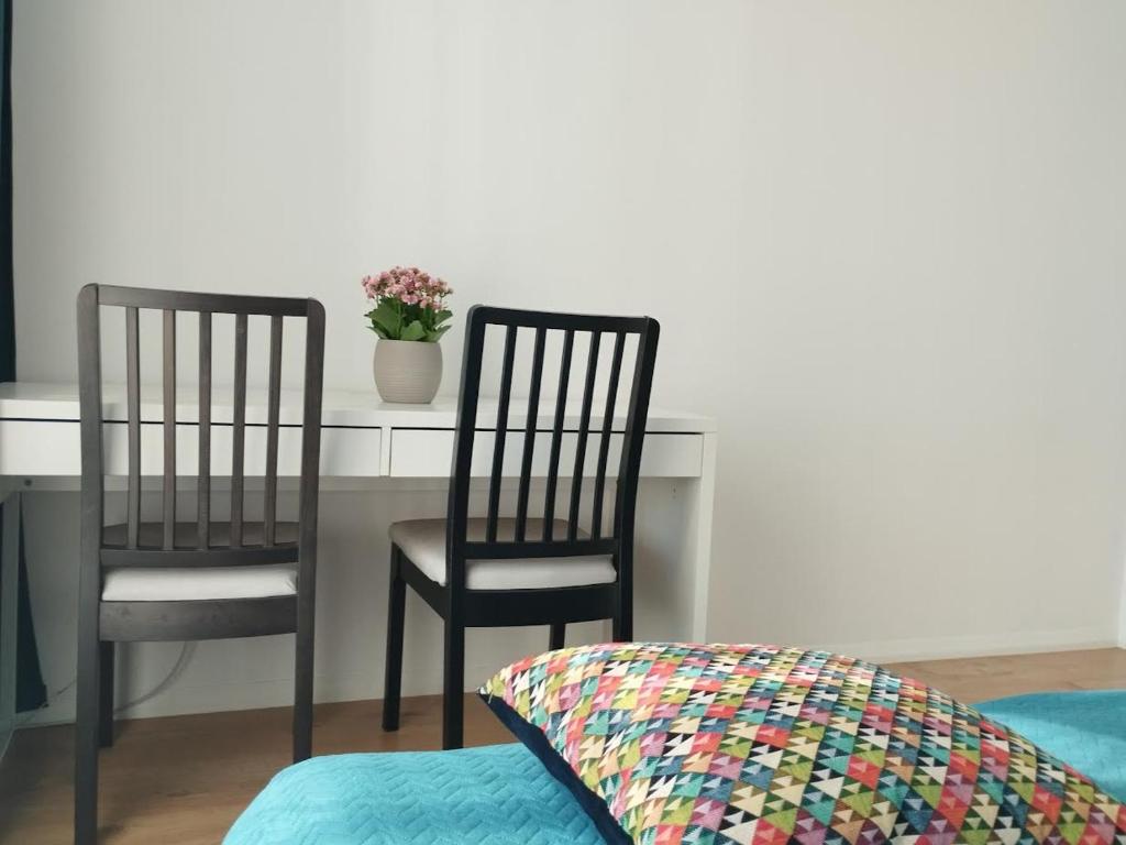 Posteľ alebo postele v izbe v ubytovaní Apartament CENTRUM/STARÓWKA Gdańsk