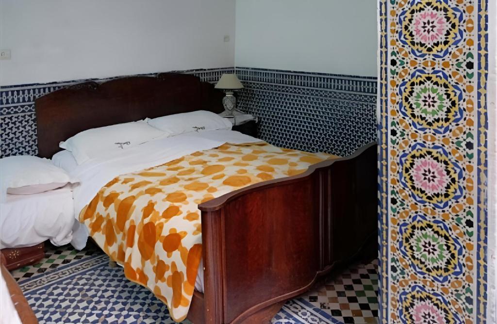 Letto o letti in una camera di Dar El Arfaoui