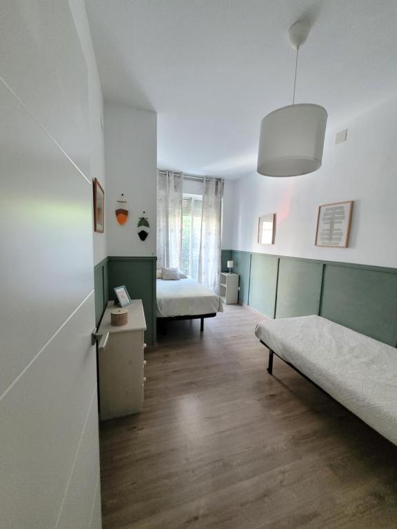 Posteľ alebo postele v izbe v ubytovaní Apartment in the center of Seville