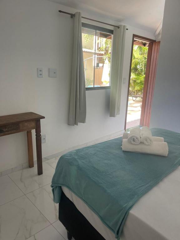 Postel nebo postele na pokoji v ubytování Do Adriano Suites