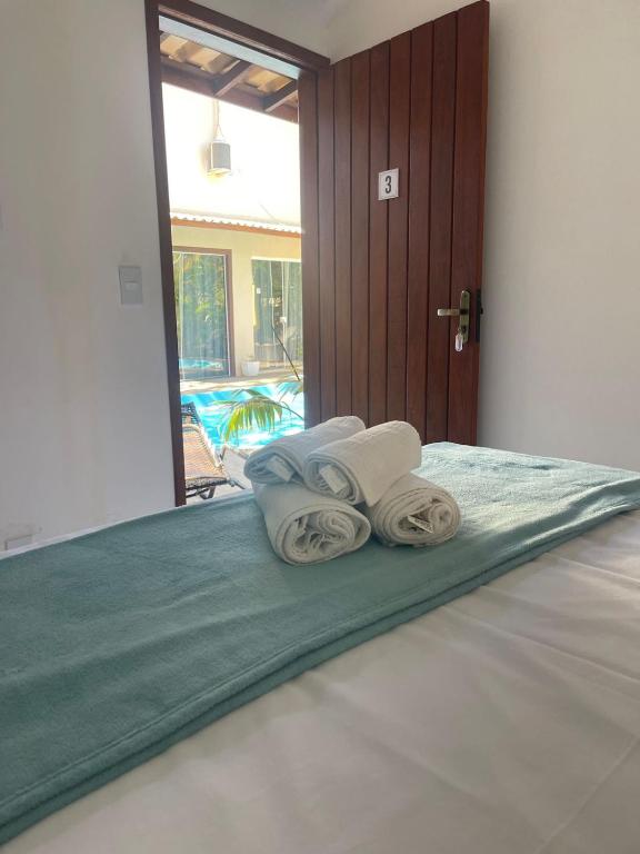 Postel nebo postele na pokoji v ubytování Do Adriano Suites