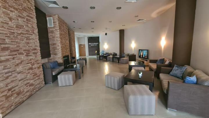Posezení v ubytování Aspen Golf Resort and SPA, Studio L306