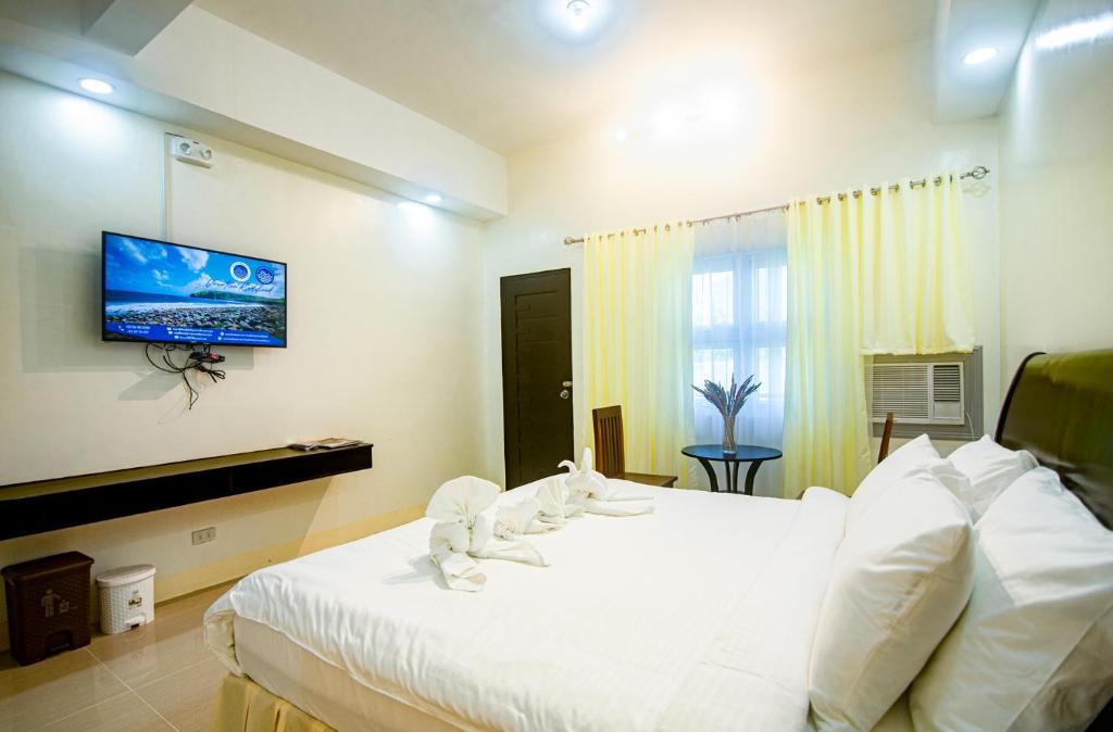 TV a/nebo společenská místnost v ubytování Boulder-Bay Residences