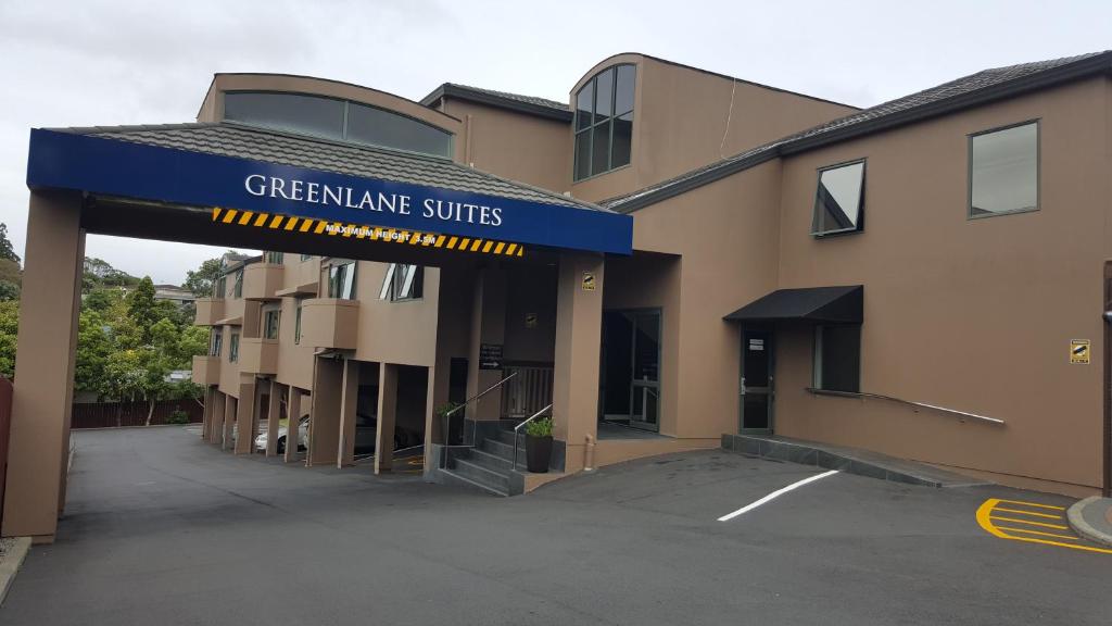 a building with a sign that reads greenline suites at Greenlane Suites in Auckland