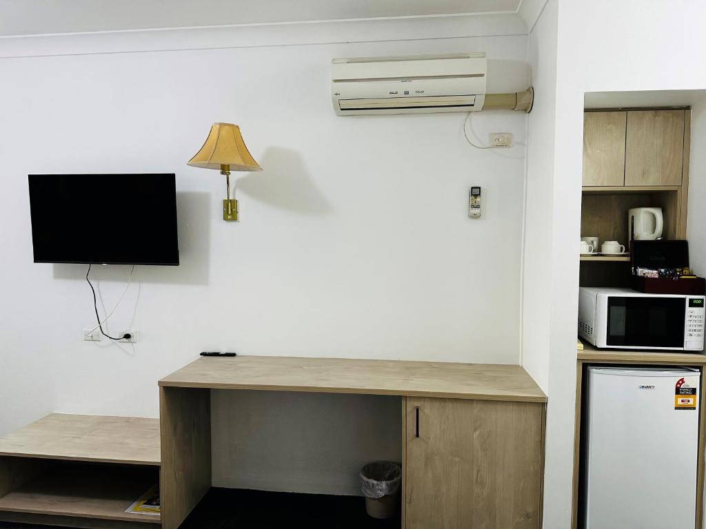 Kuchyň nebo kuchyňský kout v ubytování Oxley Motel