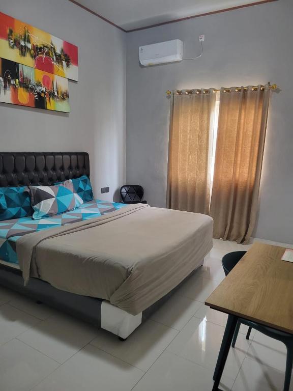 Postel nebo postele na pokoji v ubytování 9 Residences Seminyak