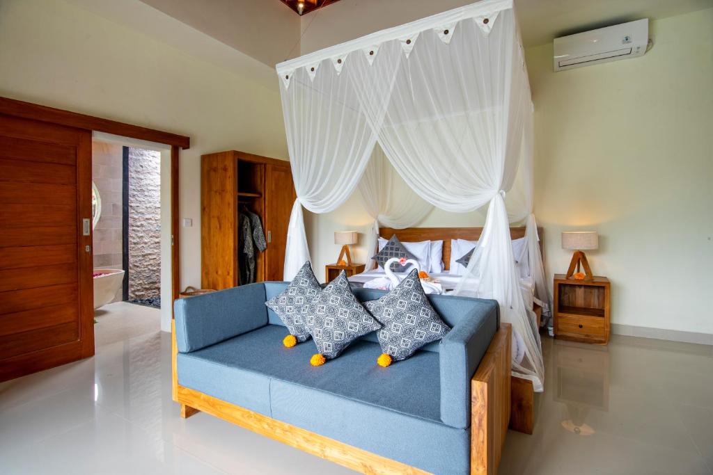 Letto o letti in una camera di Jatining Ubud Villa & Spa