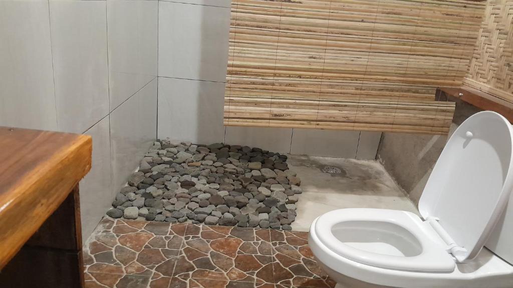 Koupelna v ubytování Bayan Exotic Homestay
