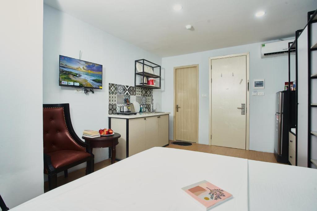 Kuchyň nebo kuchyňský kout v ubytování Eco Nest Hotel & Apartment