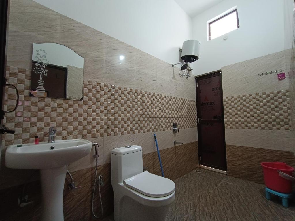 Koupelna v ubytování Hotel Mehra Inn