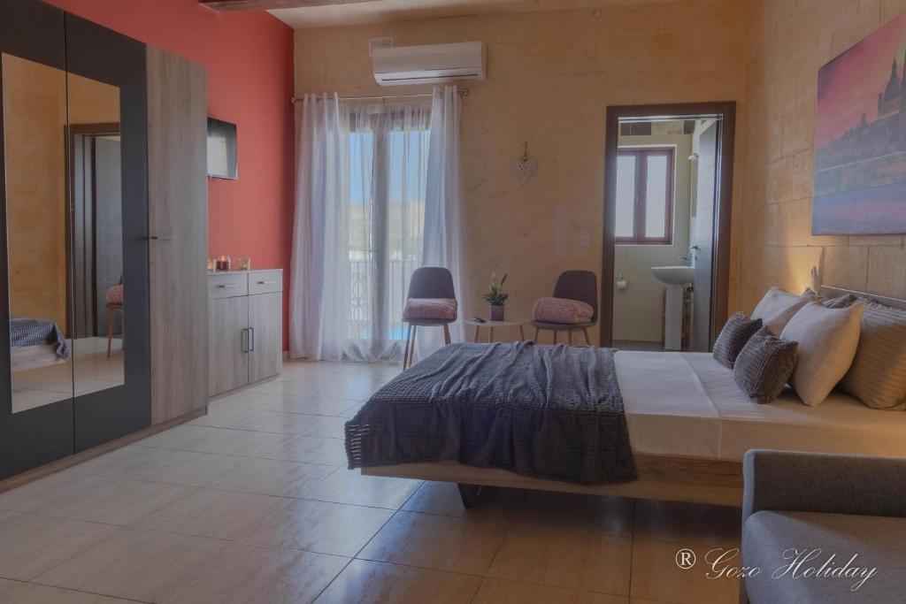 Letto o letti in una camera di Hollies