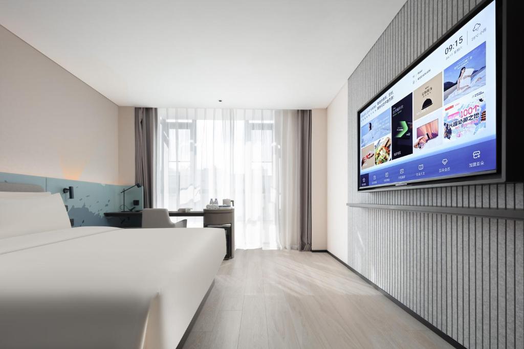 TV a/nebo společenská místnost v ubytování Atour Light Hotel Dongguan Songshan Lake University Town
