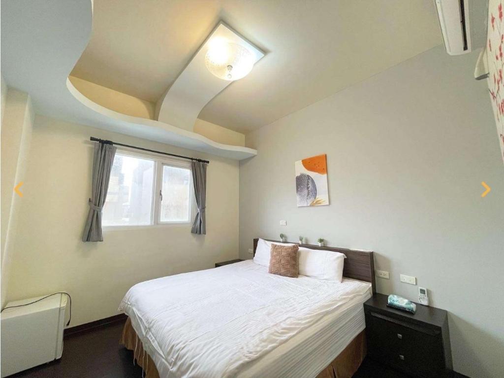 Postel nebo postele na pokoji v ubytování Miyue B&B