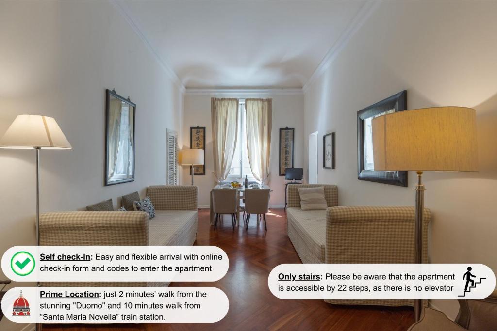 A seating area at Big apartment a stone's throw from the Duomo