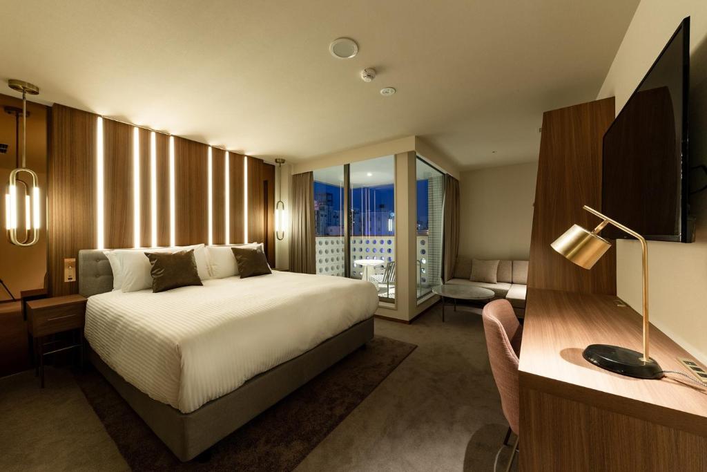 Un televizor și/sau centru de divertisment la The OneFive Villa Fukuoka - Vacation STAY 33466v