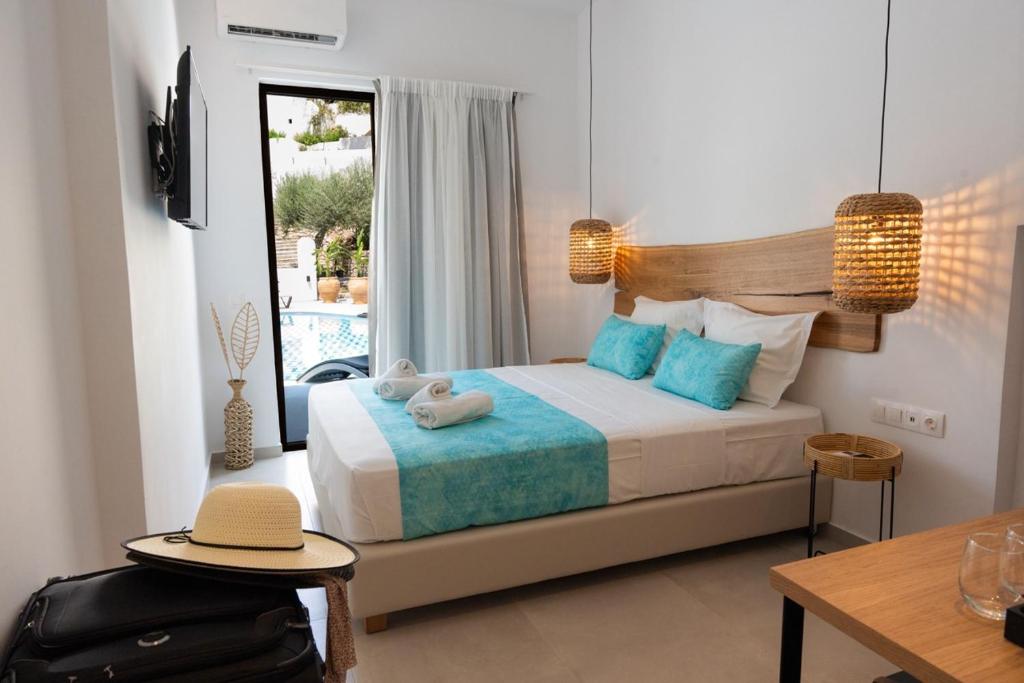 Postel nebo postele na pokoji v ubytování Zoe Boutique Hotel