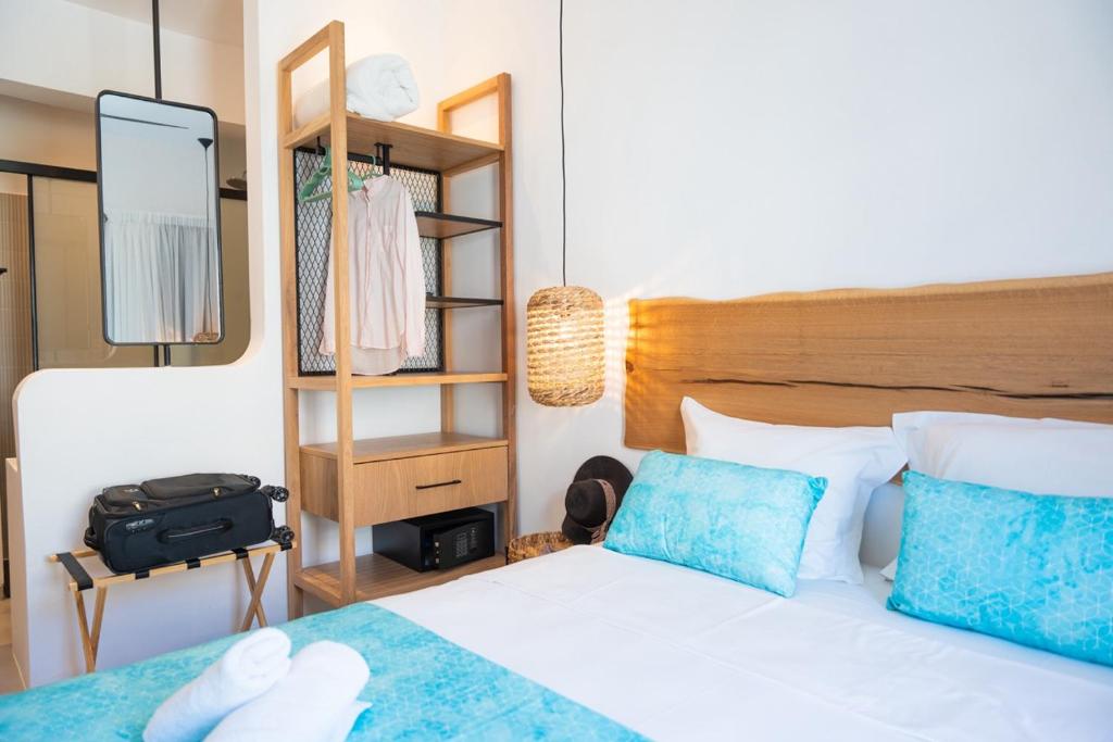 Postel nebo postele na pokoji v ubytování Zoe Boutique Hotel