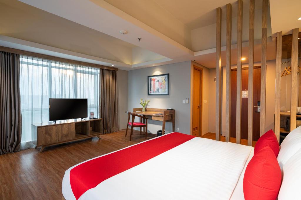 Letto o letti in una camera di Ramada by Wyndham Serpong